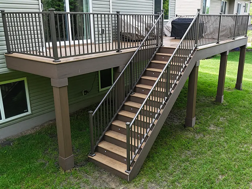 Deck steps with recessed stair lights and post-cap light fixtures